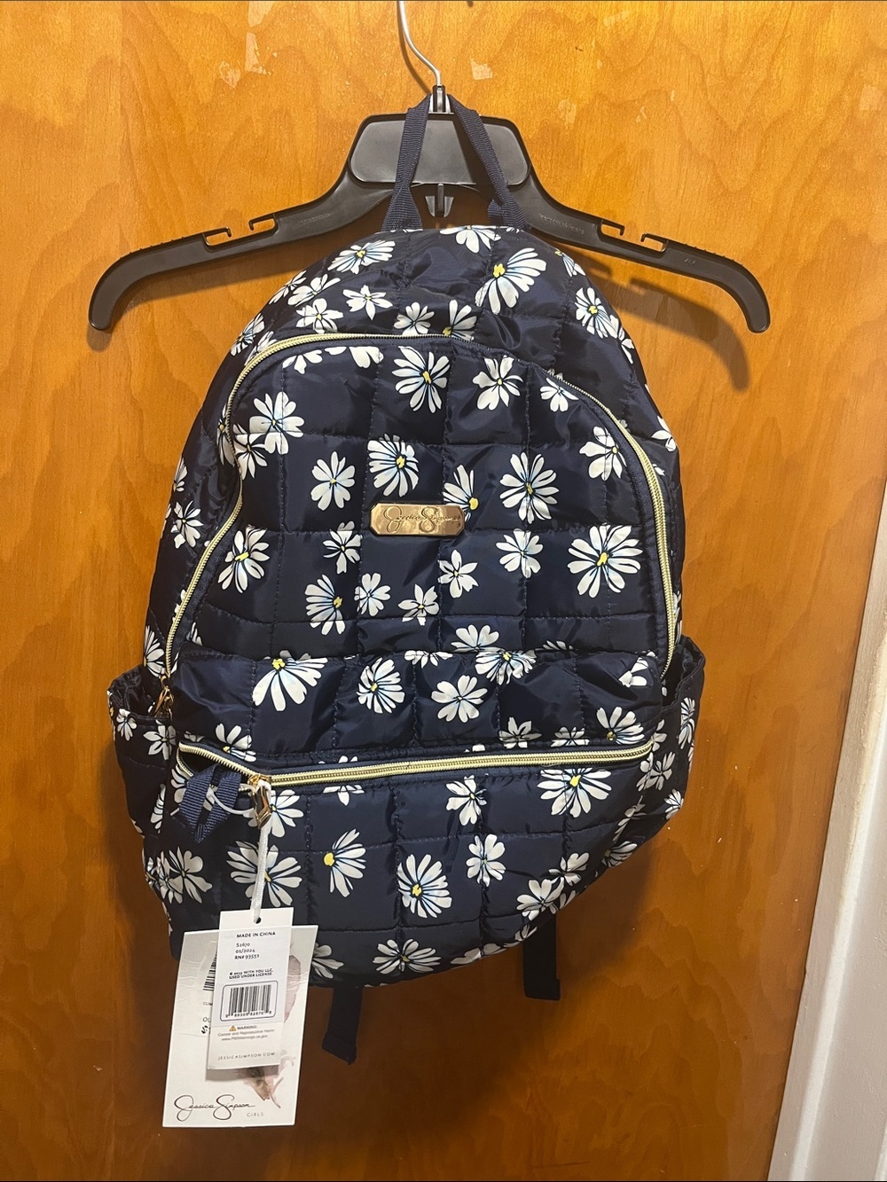 Jessica Simpson Navy Quilted Daisy Print Backpack with Gold Accents